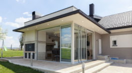 glazed terrace in the countryside with sliding glass