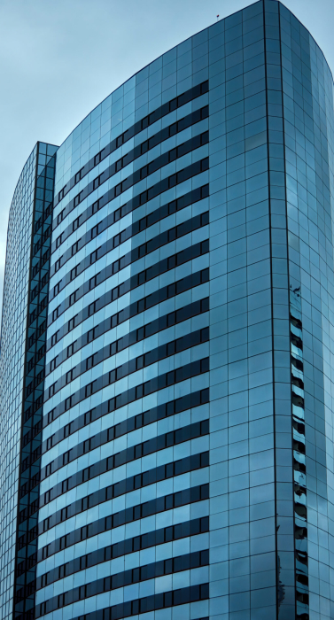 High modern building with glass facade in San Diego